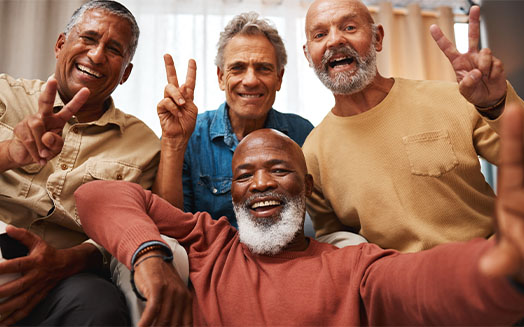 Group of Men Smiling and Posing for the Camera